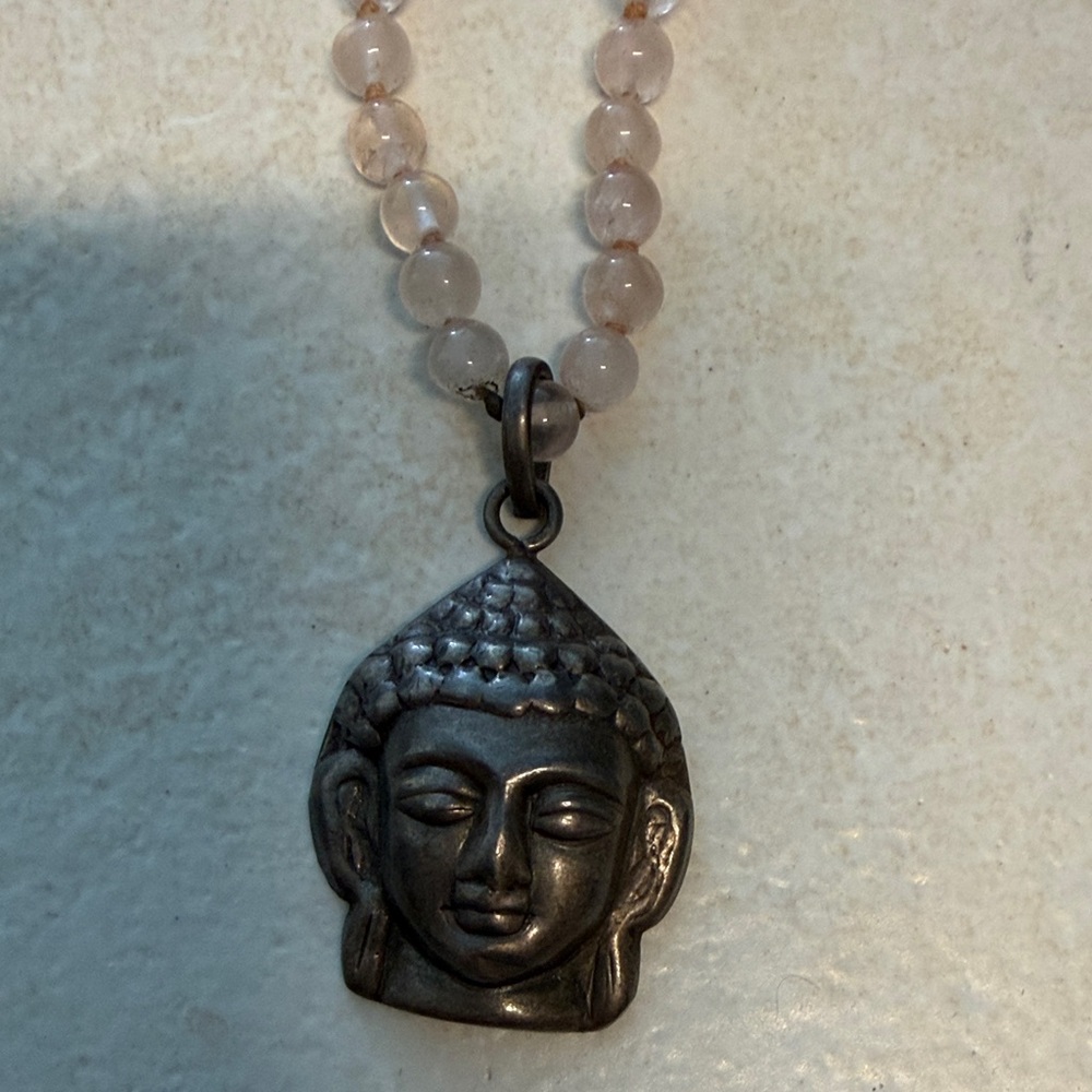 Sacred Jewelry….. buddha head on pink crystal stone necklace!  Wear the ener.